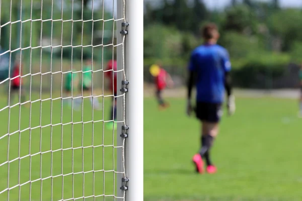 Young boys play football match — Stock Photo, Image