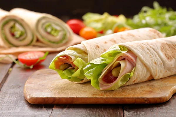 Fresh tortilla wraps with ham cheese and vegetables