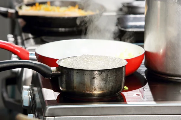 Dish cooked and boil on the stove — Stock Photo, Image