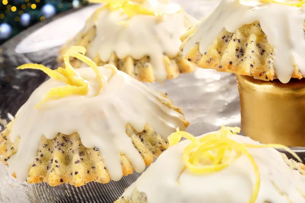 Christmas lemon poppy seed muffins on the decorated table — Stock Photo, Image