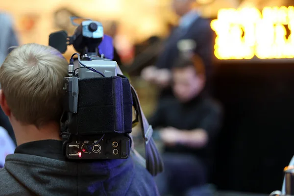 Câmera de TV filmando o evento, filmado com espaço para texto — Fotografia de Stock