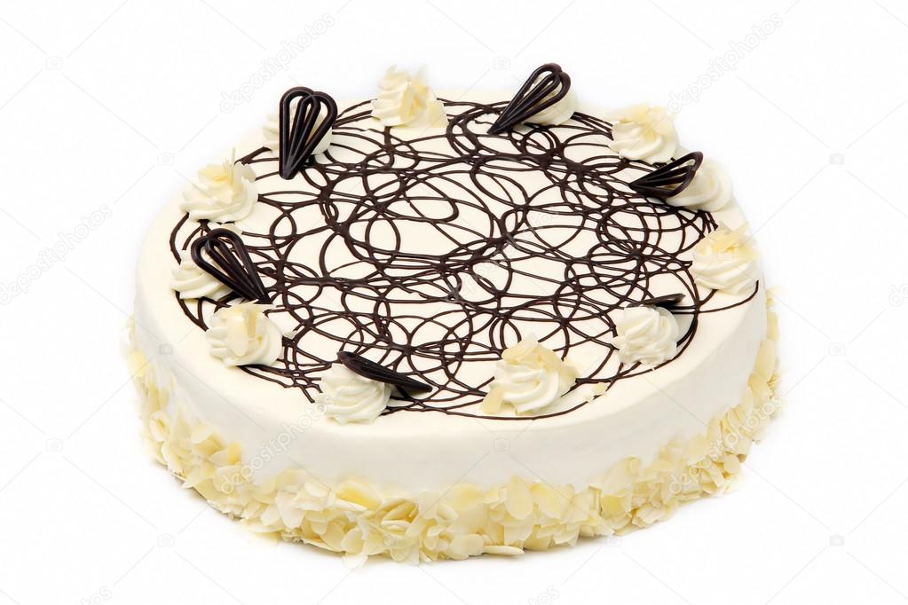 Cream almond cake with chocolate icing on white background