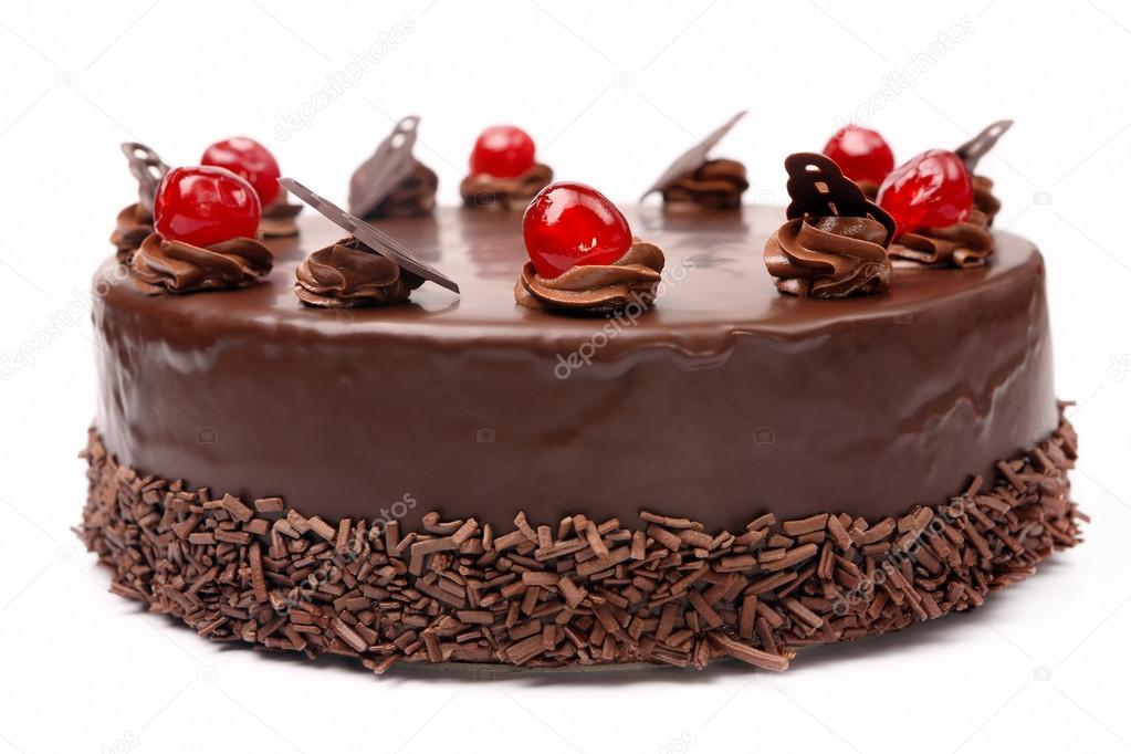 Cream chocolate cake with cherries on white background