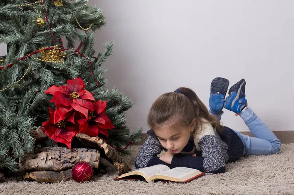 Boy Reading Book Next Christmas Tree — Stock Photo, Image