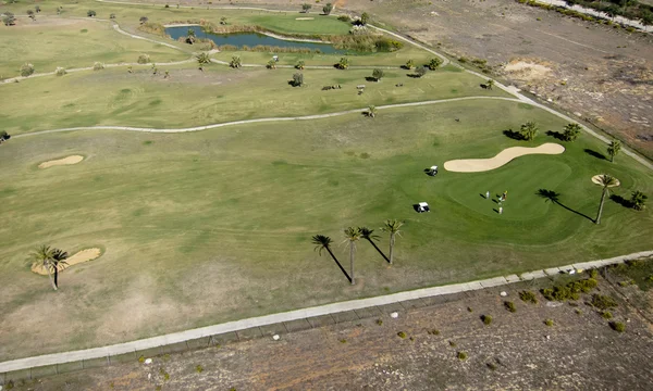 Golf spielen — Stockfoto