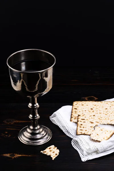 holy communion chalice with wine, bread and Bible. Lord's supper.