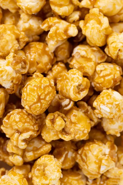 caramel popcorn texture background. Caramel popcorn close up.