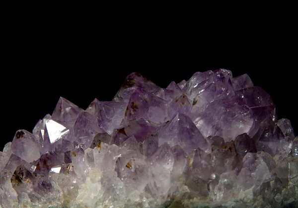 Purple amethyst over black — Stock Photo, Image