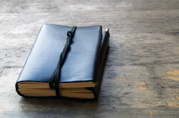 Leather bound journal outdoors — Stock Photo, Image