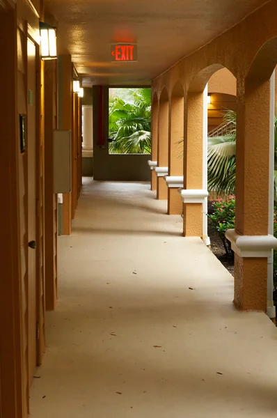 Outside hallway with exit sign — Stock Photo, Image