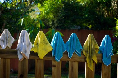 dirty rags hanging on fence clipart
