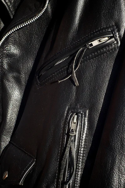 Close up of traditional black classic leather biker jacket — Stock Photo, Image