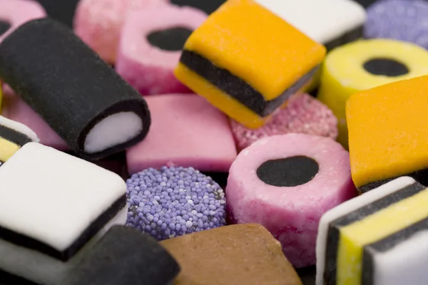 Bakgrund av liqurice allsorts godis. — Stockfoto