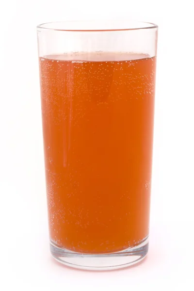 Glass of fizzy orange over white — Stock Photo, Image