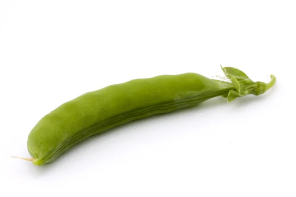 Single pea pod over white. — Stock Photo, Image