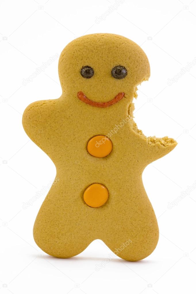 Gingerbread man with bite missing over white.