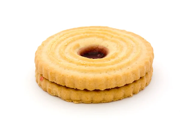 Single jam filled biscuit over white — Stock Photo, Image
