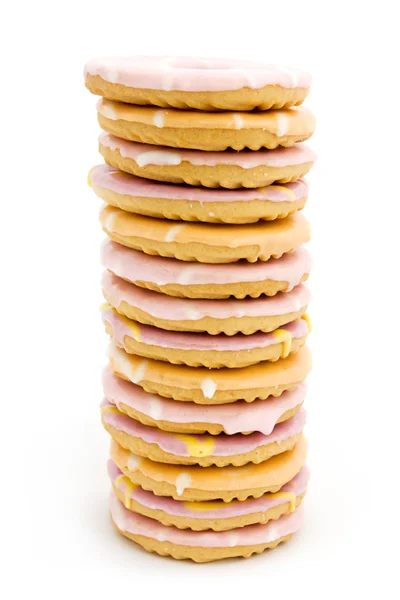 Tower of iced biscuits over white — Stock Photo, Image