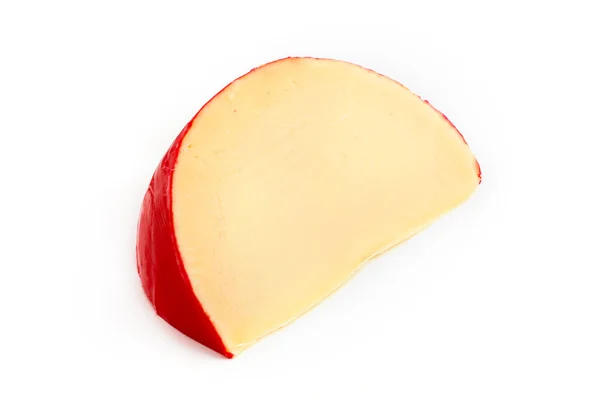 Fatia de queijo Edam sobre branco — Fotografia de Stock