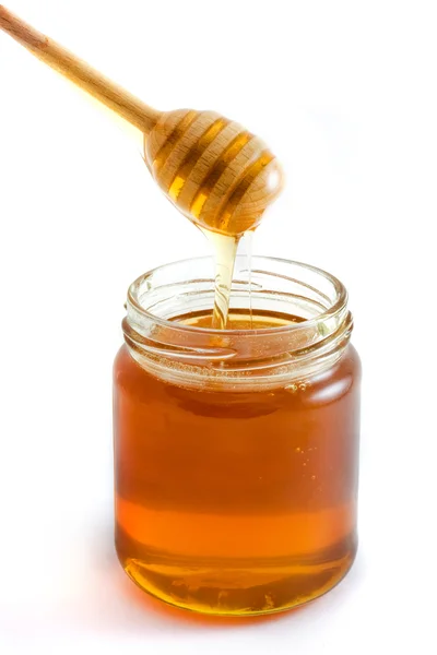 Csöpögő jar felett fehér méz — Stock Fotó