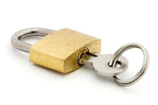 Padlock and key over white — Stock Photo, Image