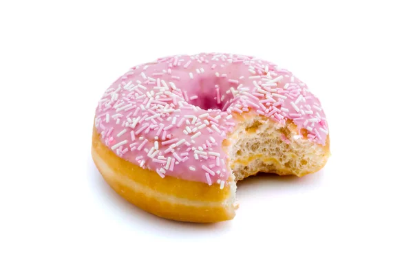 Roze donut met een hap genomen uit geïsoleerde op wit — Stockfoto