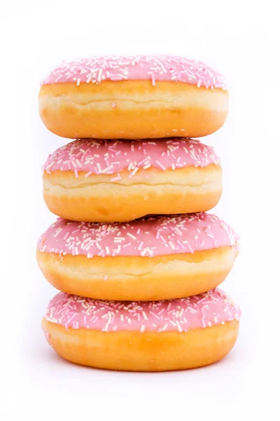 Stack of pink iced doughnuts — Stock Photo, Image