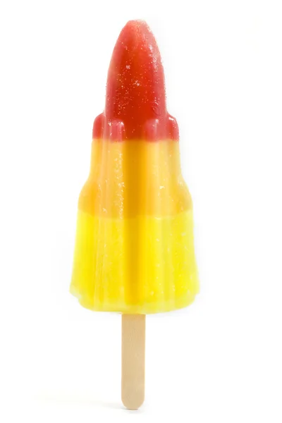 Rocket shaped ice lolly over white — Stock Photo, Image