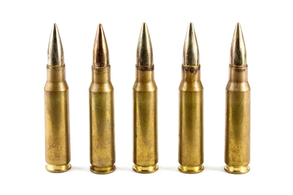 Row of five rifle bullets — Stock Photo, Image