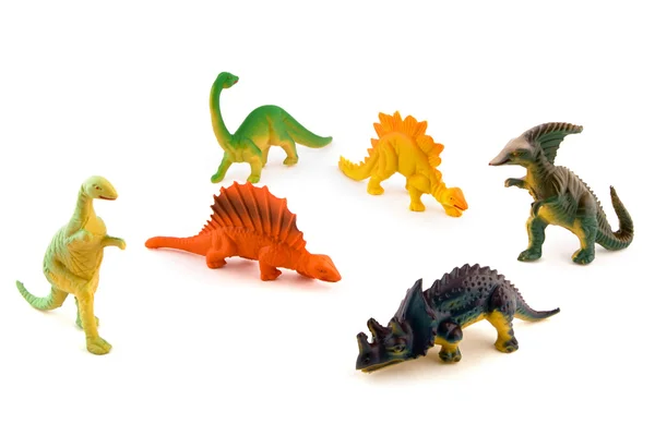Group of toy plastic dinosaurs