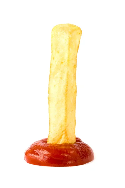Французька Фрай, будучи змоченою в кетчуп — стокове фото