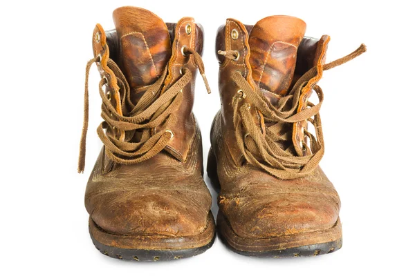 Kahverengi deri çizmeler beyaz üzerinde çalışmama