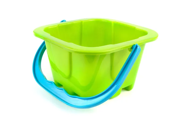 Green plastic kids bucket on white — Stock Photo, Image