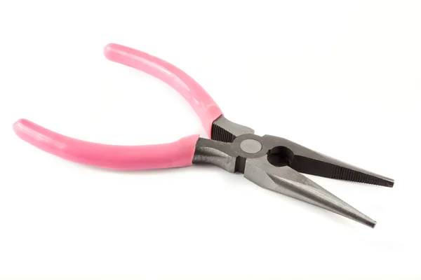 Pliers with pink handles over white. — Stock Photo, Image