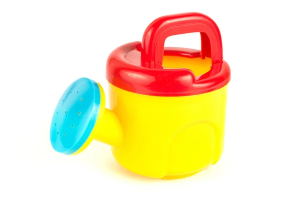 Красная и желтая банка для полива игрушек — стоковое фото