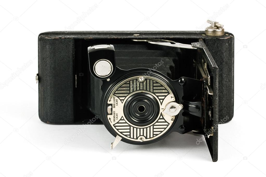 Antique fold away camera on white