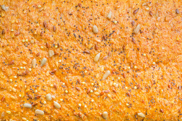 Background texture of a seeded loaf of bread