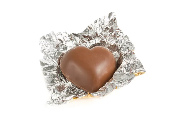 Serce w kształcie czekolada w opakowanie folia — Zdjęcie stockowe