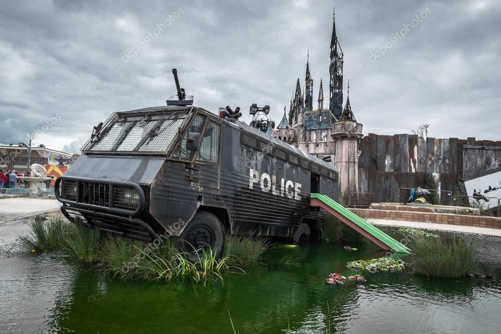 A police riot van in Water Cannon Creek at Banksy's Be Stock Editorial Photo © lucielang #83227512