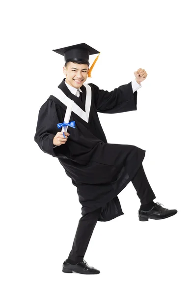 Szczęśliwy młody mężczyzna kolegium graduation taniec — Zdjęcie stockowe