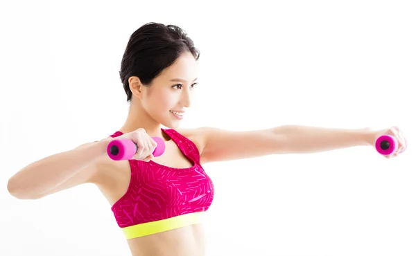 Fitness junge Frau trainiert mit Kurzhanteln — Stockfoto