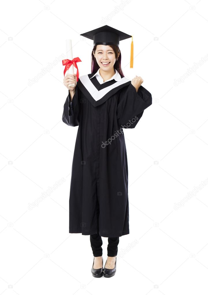 Full Length Of Young Female College Graduation Stock Photo