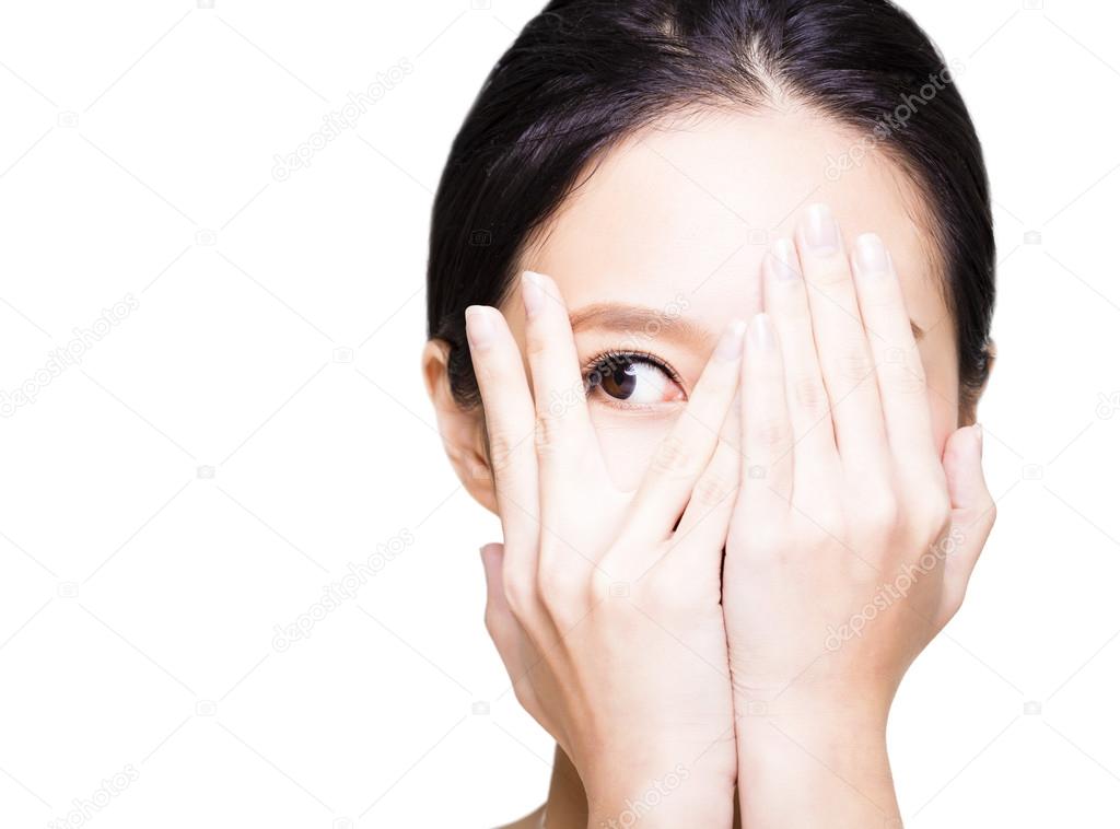 Young woman covering her eyes by hands — Stock Photo © tomwang 102281576