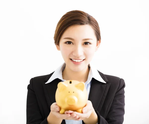 Mosolygó üzleti nő mutatja a piggy bank — Stock Fotó