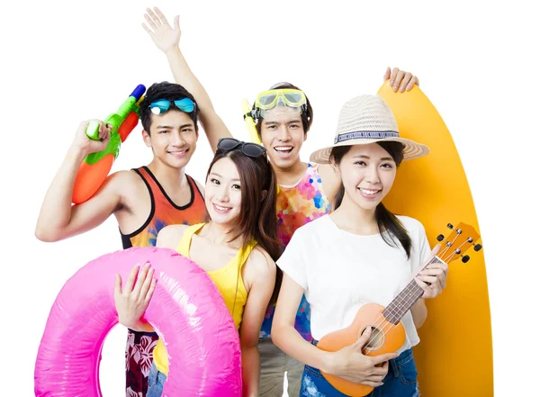 Happy young Group  holding beach accessories — Stock Photo, Image