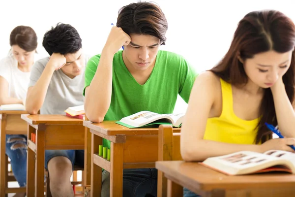 Young college student group study in a classroom — Stock Photo, Image