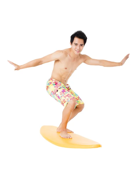 Młody człowiek z desek surfingowych na białym tle — Zdjęcie stockowe