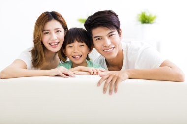 Happy Attractive Young  Family and little girl