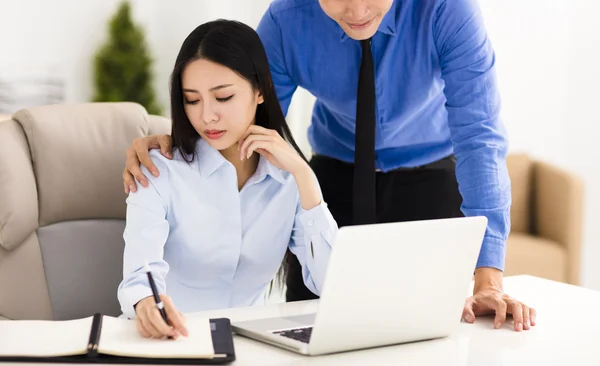 Business man harassing  colleague in office — Stock Photo, Image
