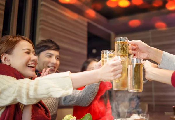 Happy Friends Drinking Toasting Beer Hot Pot Restaurant — Stock Photo, Image